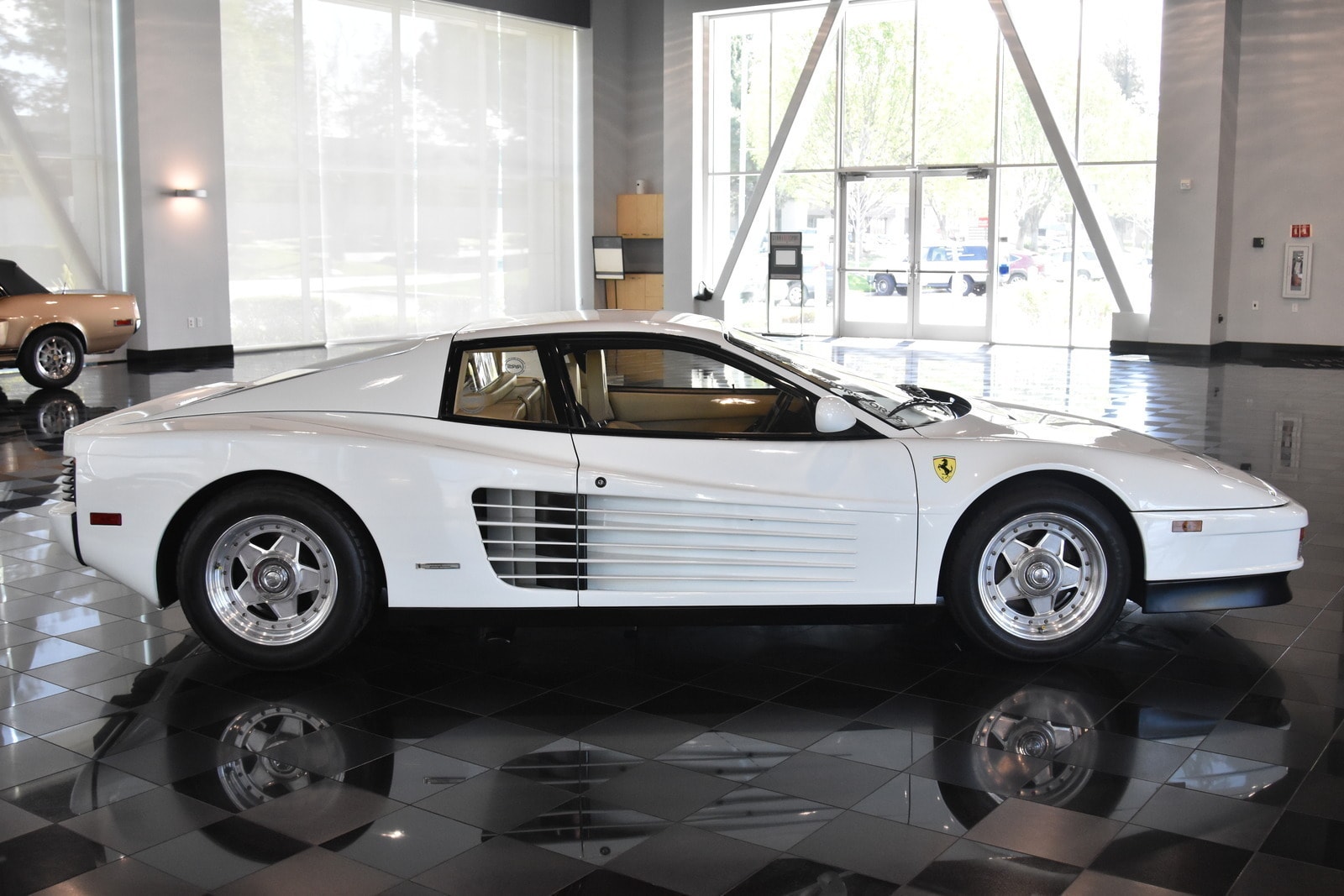 Ferrari Testarossa — white over tan, Miami Vice spec. One of the most iconic shapes of the 1980s.